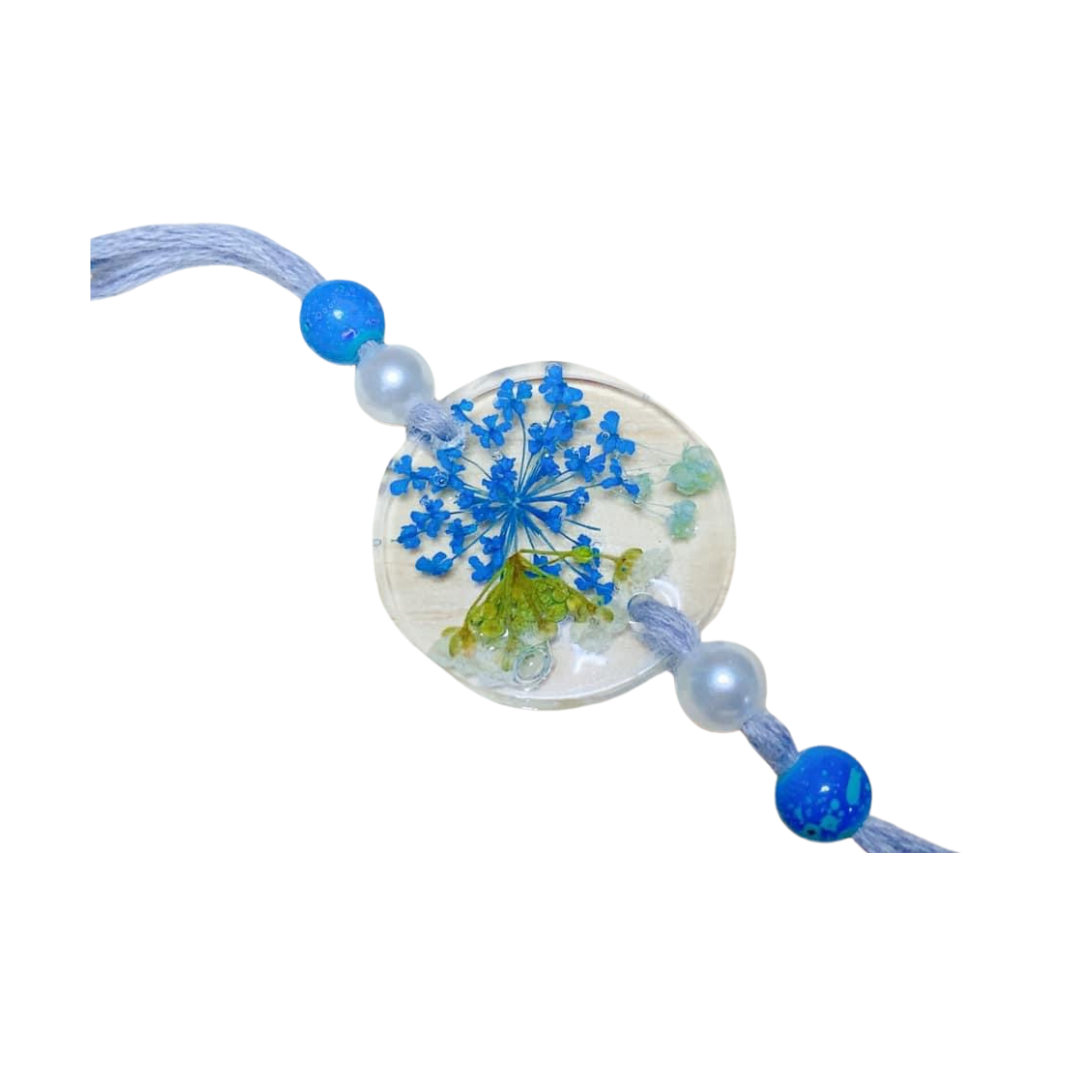 Resin blue flower Rakhi